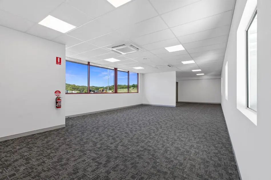 Completed commercial interior with lighting and ceiling services